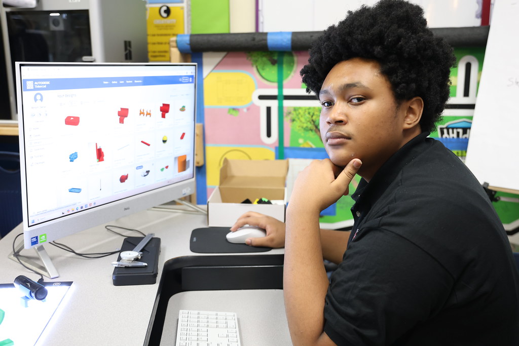 A student at a design workstation inside the lab